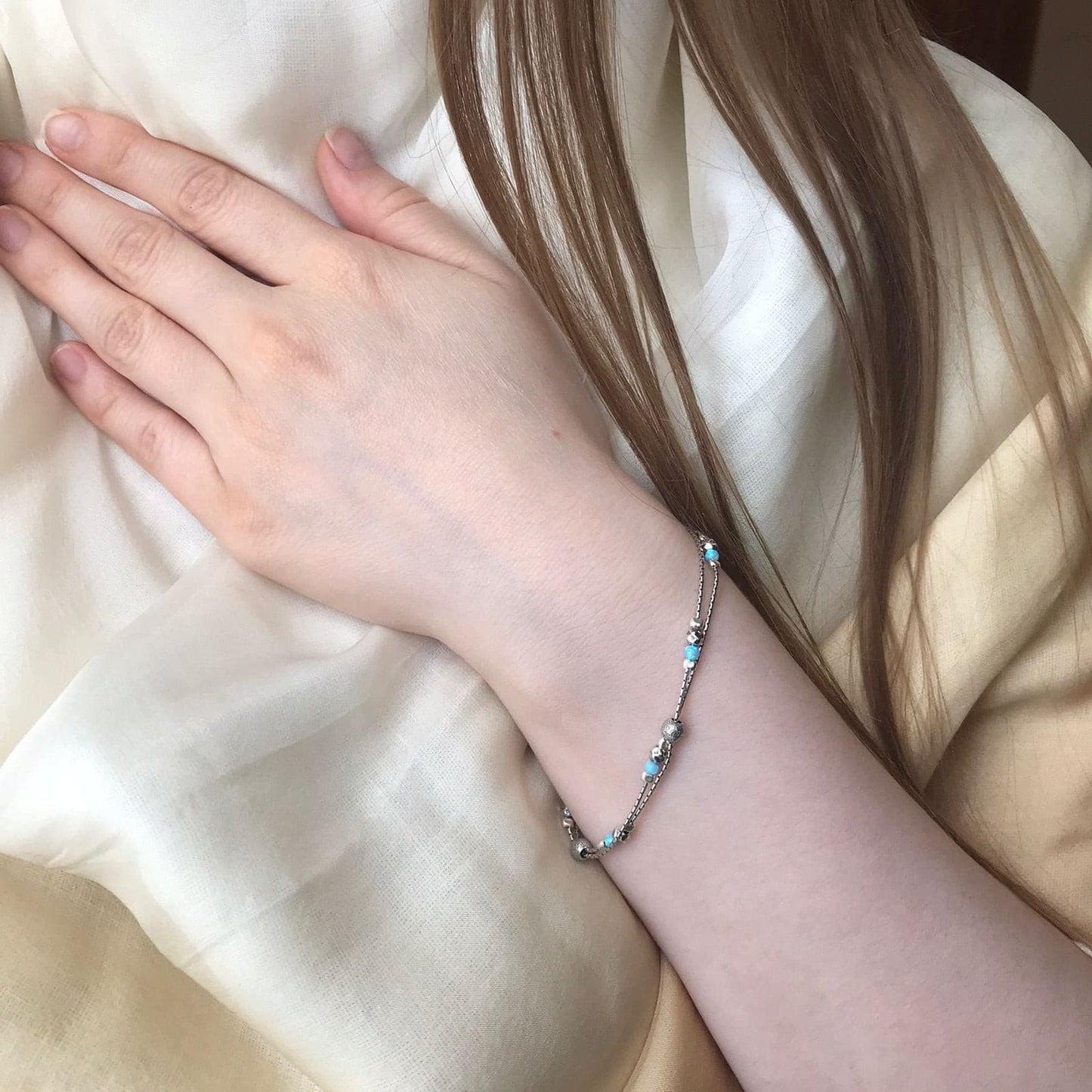 Silberarmband mit Opal 01B988OP