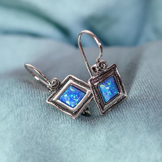 Silver earrings with opal 01E076OP