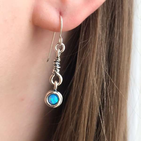 Silberne Ohrringe mit Opal 01E2127OP