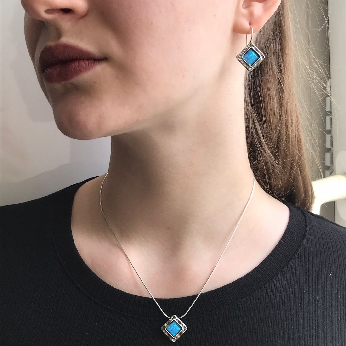 Silver earrings with opal 01E731OP