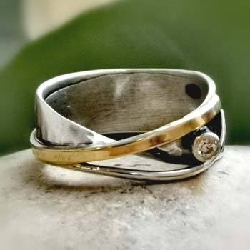 Серебряное кольцо с цирконом и золотом MVR1529GCZ